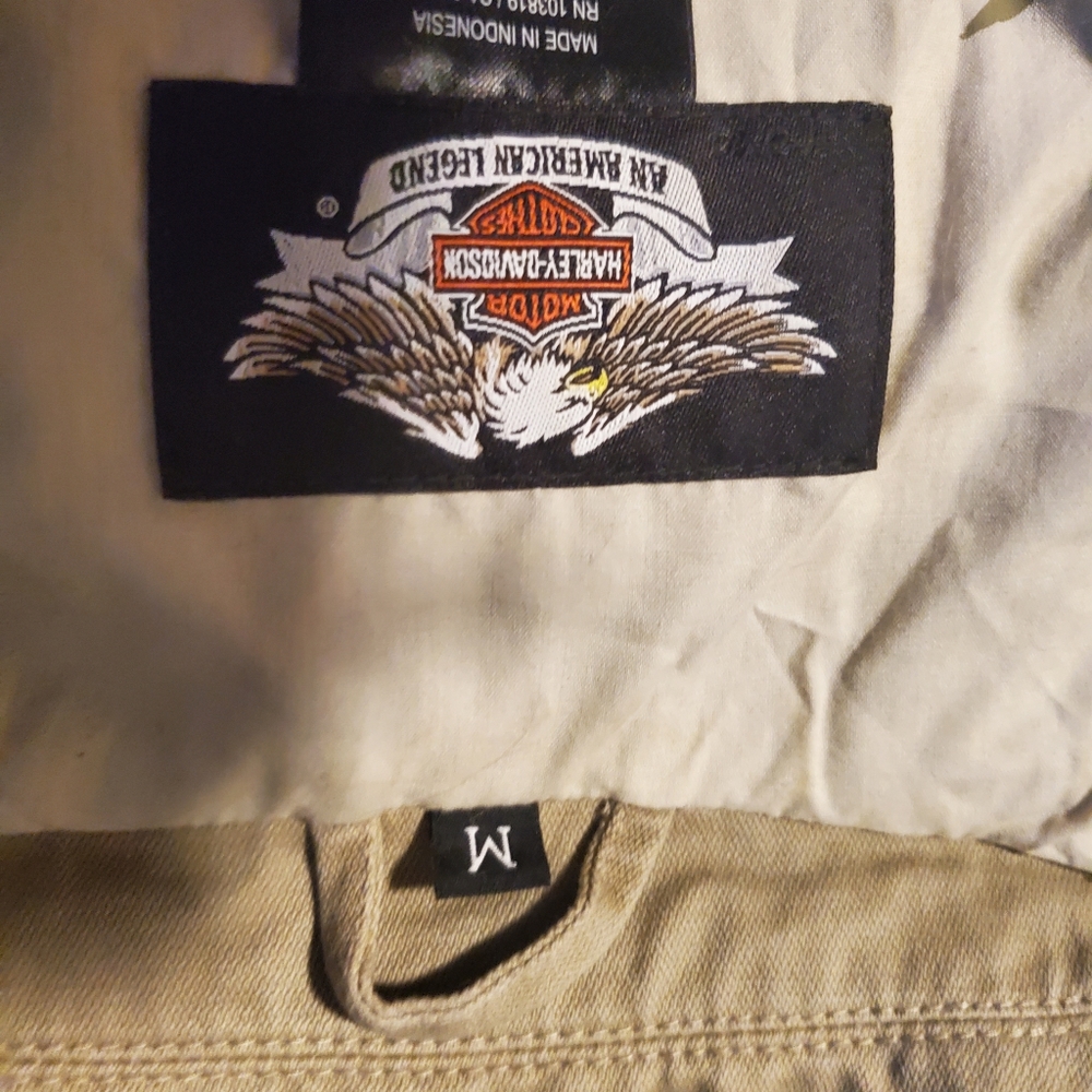 Authentic Harley Davidson women's jacket. Medium size.  Heavy duty denim tan.